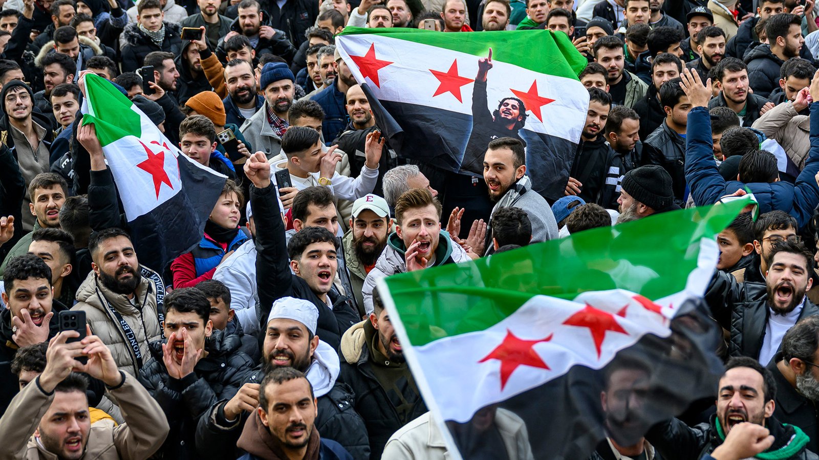 Geëxileerde Syriërs wereldwijd vieren het einde van het regime van Assad