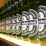 Heineken ervaart stijgende bierverkopen, maar winst gehalveerd