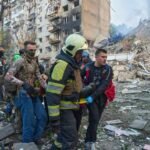 Foto's: Rusland voert 'gruwelijke' aanval uit op Kyiv