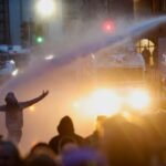 Nederland Noord getroffen door derde nacht van 'racistische' geweld, belangrijkste brandpunt rustiger