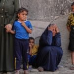 Week in Afbeeldingen: Israël's Gaza Offensief en Protesten in Servië