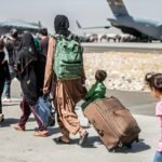 Afghanen in de VS herdenken de Taliban-overname van Kabul te midden van strenge immigratieregels onder Trump