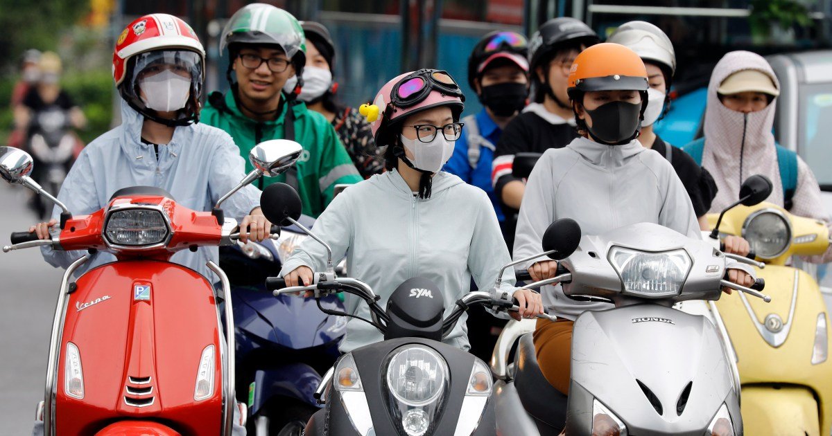 Vervaardiging van benzinescooters in Hanoi: Bezorgdheid over gevolgen voor levensonderhoud