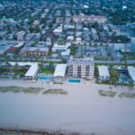 Vermindering van emissies vóór het midden van de eeuw kan 0,6 meter zeespiegelstijging voorkomen